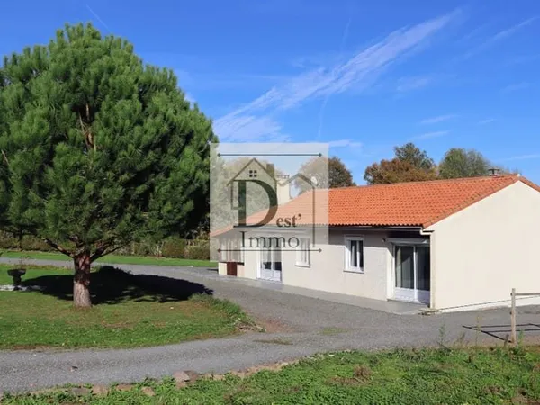 Plain-Pied d'Exception avec 5000 m2 et Atelier à Excideuil-sur-Vienne