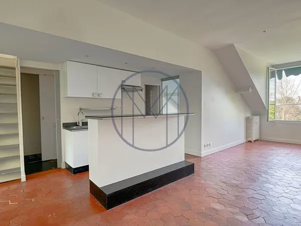 Rive Droite dans Hôtel particulier - Duplex 4/5 pièces de 57.10 m² carrez, 90 m² au sol