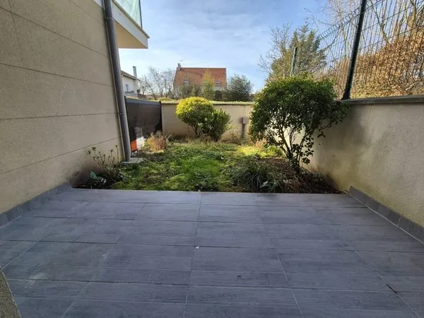 Appartement F2 avec jardin privatif