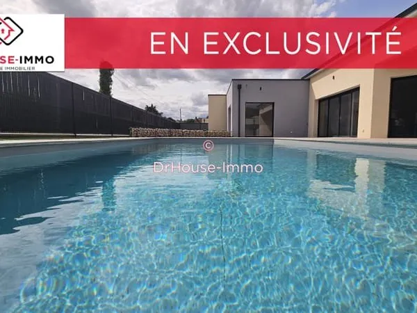 Plain-pied de 6 pièces avec garage, jardin et piscine
