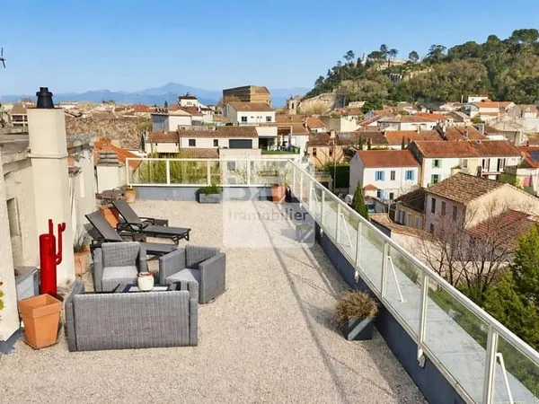 Magnifique appartement avec toit terrasse privatif, garage, cave