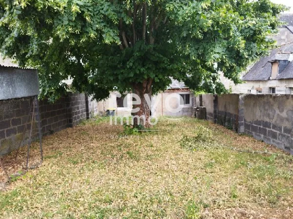 Maison ville de plain - pied avec terrain constructible