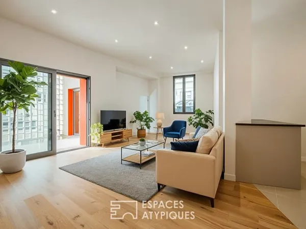 Lignes fifties et terrasse privée : un appartement contemporain au coeur de Royan