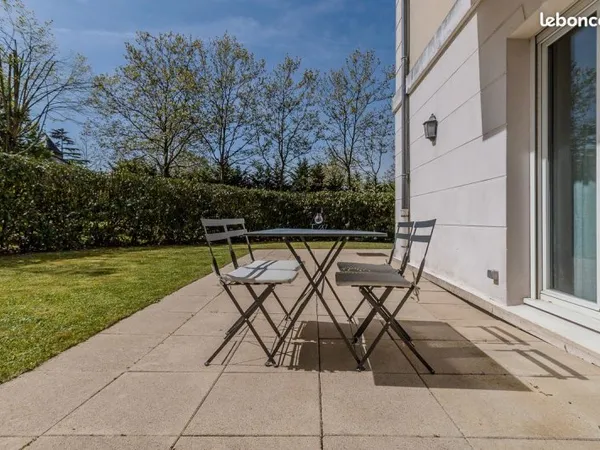 Appartement avec grand jardin proche gare