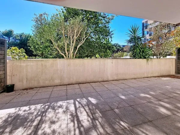 A VENDRE A Juvignac Appartement de type trois pièces 59 m2 terrasse pkg sous-sol