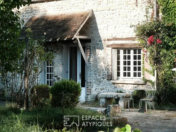 Demeure de caractère avec jardin et vivier