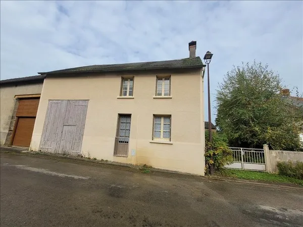 Maison de bourg de 4 pièces principales