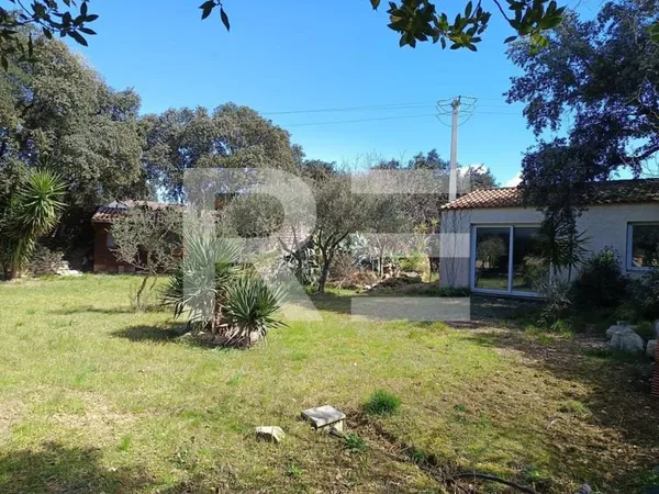 A vendre terrain constructible arboré et viabilisé de 600m2