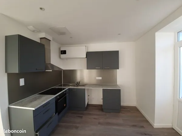 Appartement F2 proche commerces et lycée
