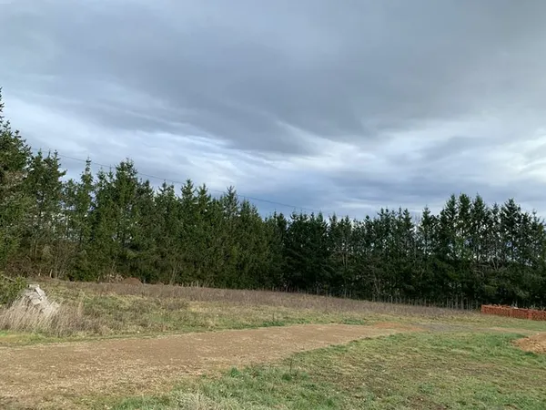 BROMONT-LAMOTHE TERRAIN A BATIR DE 1510 M² AVEC VUE