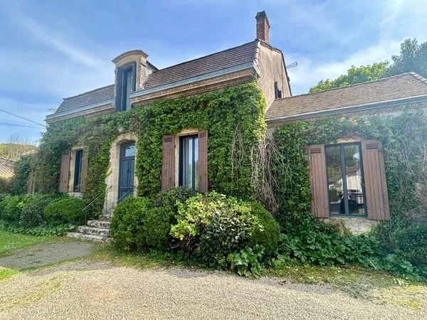 Maison 7 pièces 215 m²