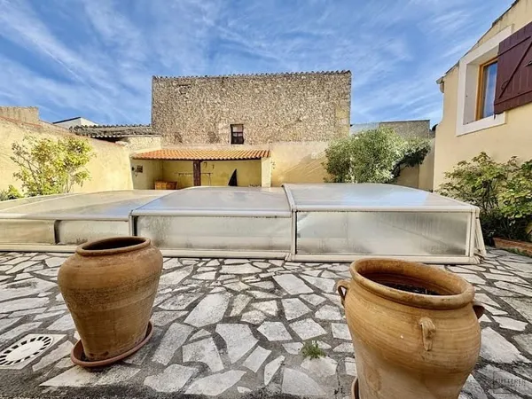 Maison 8 pièces 261 m²