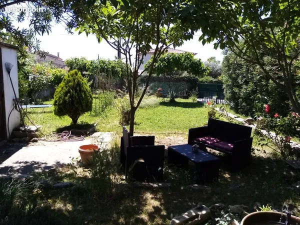 Maison ancienne avec petit terrain