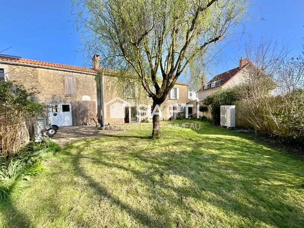 Maison de caractère 130m2, 4 chambres, garage et jardin