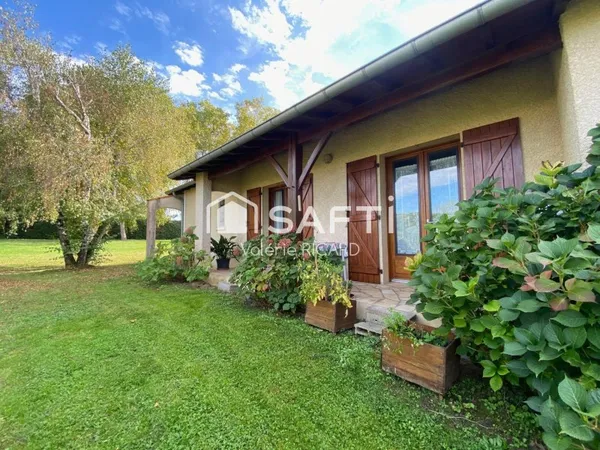 Maison T6 avec garage sur terrain arboré de 2000m2