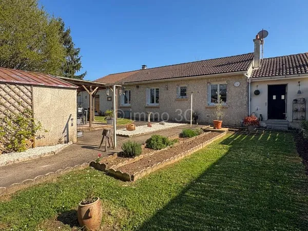 Pavillon plain-pied avec garage et jardin