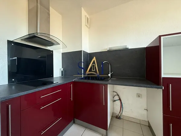 APPARTEMENT T3 AVEC ASCENSEUR + LOGGIA + PARKING - ST ASSISCLE