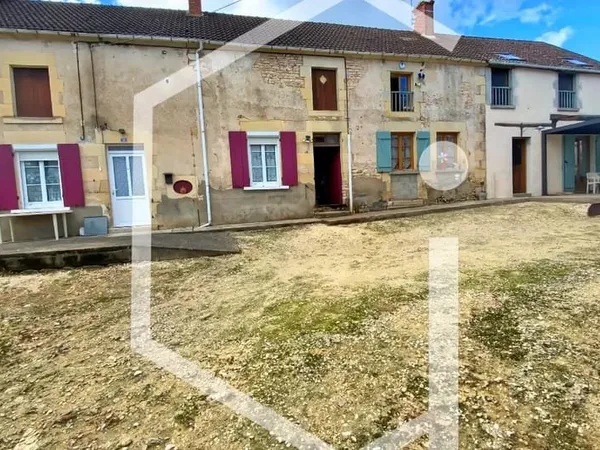 Ensemble immobilier composé de 2 maisons granges et jardin