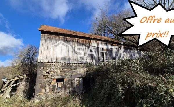 Grange à rénover entièrement sur terrain 740 m² au calme, beau potentiel.