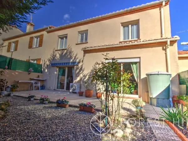 Maison 2 faces avec jardin et prestations de confort