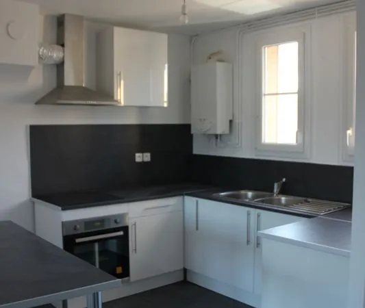 Appartement F3 de 57m2, avec balcon, cave, garage + parking
