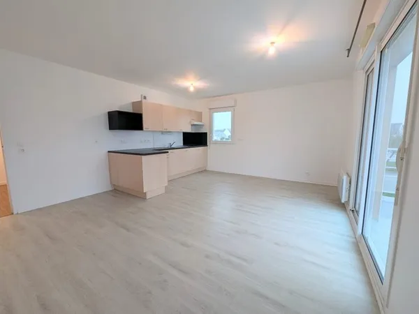 Appartement T2 - 51 m2 avec balcon et box (garage) fermé D
