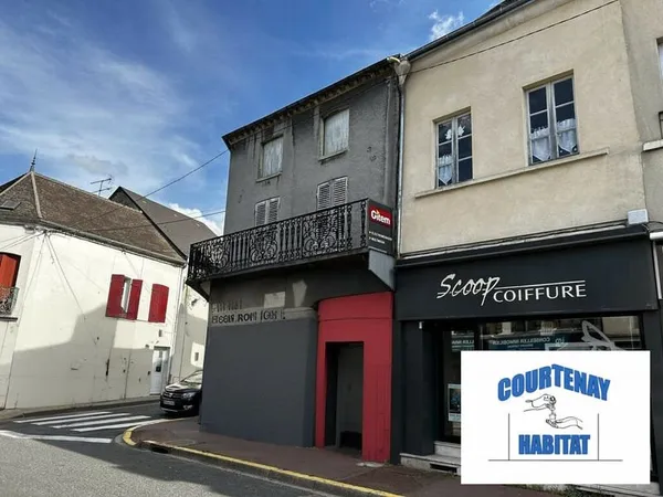 Immeuble avec local commercial