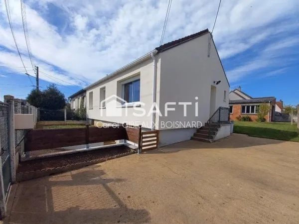 Maison familiale proche des commodités avec sous-sol, garage et terrain