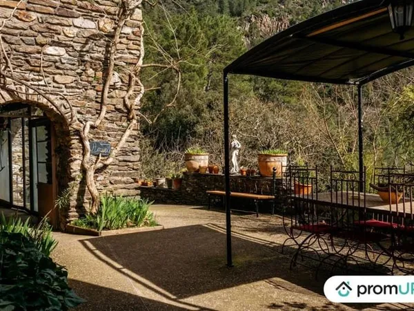 Mas de 220 m2 à CHAMBON
