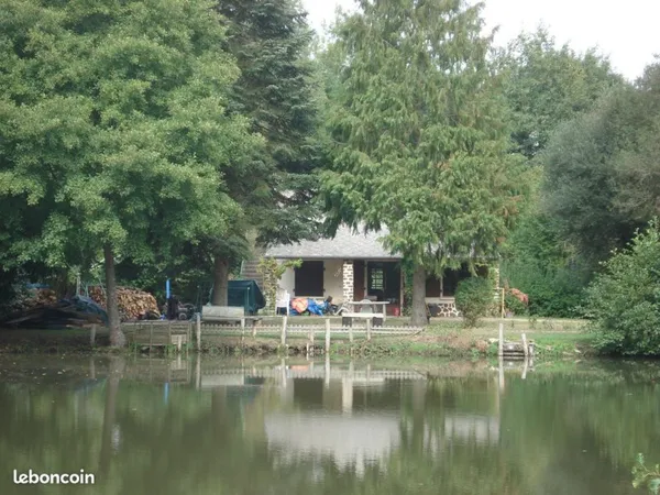 Maison avec étang