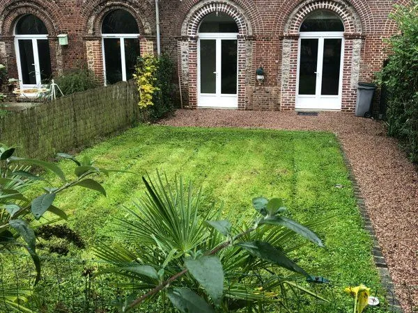 Appartement T3 75 m² rez-de-jardin avec jardinet privé