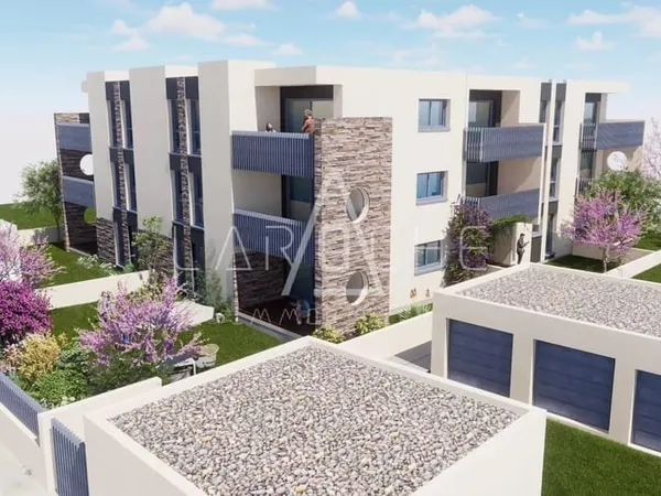 APPARTEMENT T2 + JARDIN - PARKING
