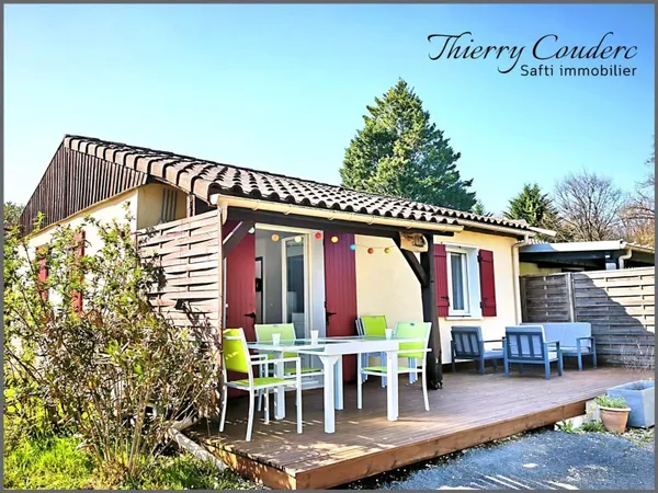 Gîte de 37 m² avec terrain de tennis et piscine.
