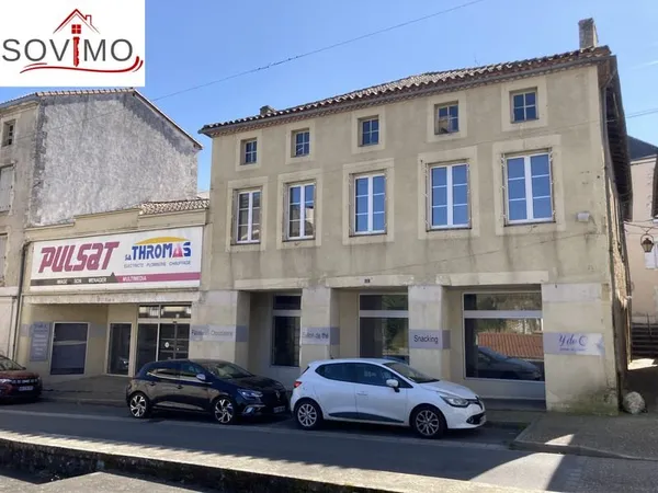 AU COEUR DE LA VILLE, IMMEUBLE À USAGE COMMERCIAL ET HABITAT