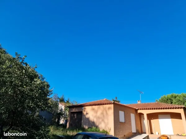 Maison de plein pied de 98 m² en L plus garage 13m²