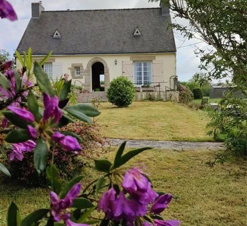 Maison avec grand terrain arboré
