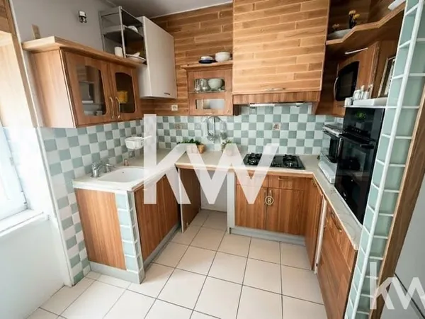 VENTE d'un appartement de 5 pièces (100 m²) à SAINT ETIENNE