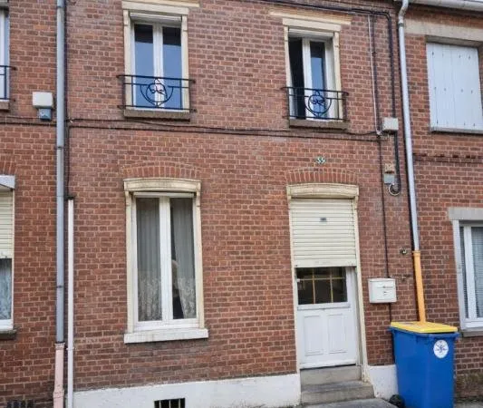 Maison avec garage et cour ? Idéal investissement locatif ? Rentabilité 11,2 %