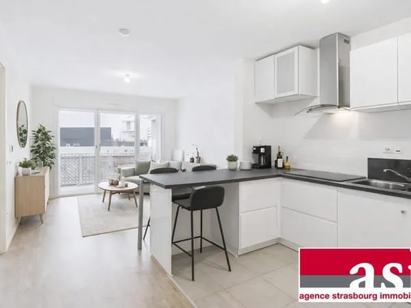 Appartement 2P de 43 m² - Balcon - Cave et deux parking
