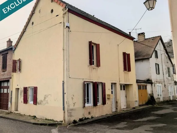 Maison 75 m², 2 chambres, un bureau et un garage.