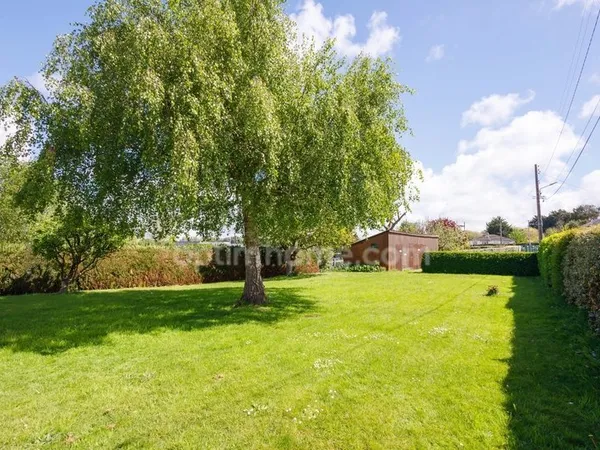 HONFLEUR - TERRAIN CONSTRUCTIBLE 702 m² AVEC GARAGE EXISTANT - LIBRE DE CONSTRUCTEUR