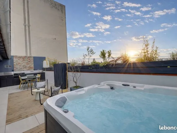 Duplex d'exception - beaux volumes - terrasse avec spa - parking
