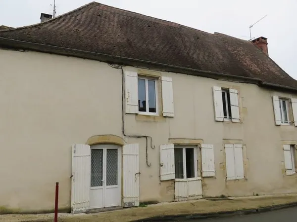 Immeuble de rapport :Maison en pierres (env 285m2), divisée
