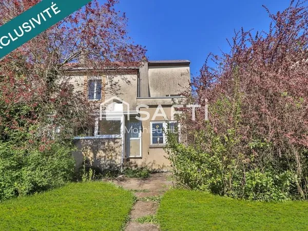 Maison mitoyenne de 117 m² avec jardin.