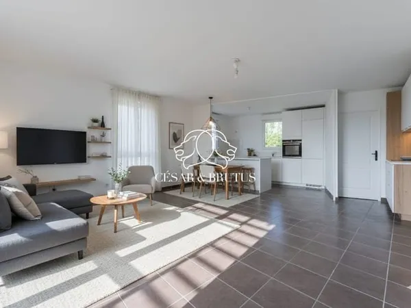 VÉNISSIEUX - Appartement 4 pièces de 84 m² avec terrasse et g