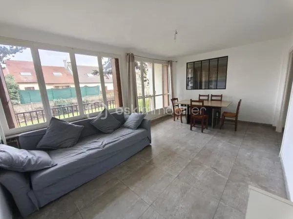 Appartement 3 pièces de 65m² avec balcon, parking et cave