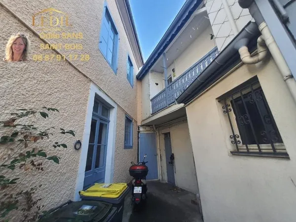 Maison jardin + local commercial loués