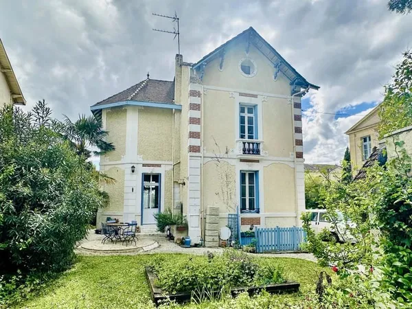 Maison de 6 chambres avec garage et jardin