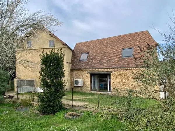 Maison à pied des commerces