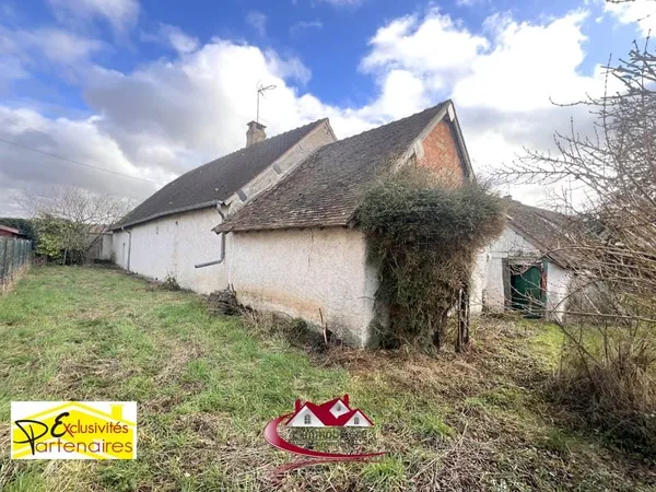 Maison à réhabiliter avec jardin de plus de 500 m2